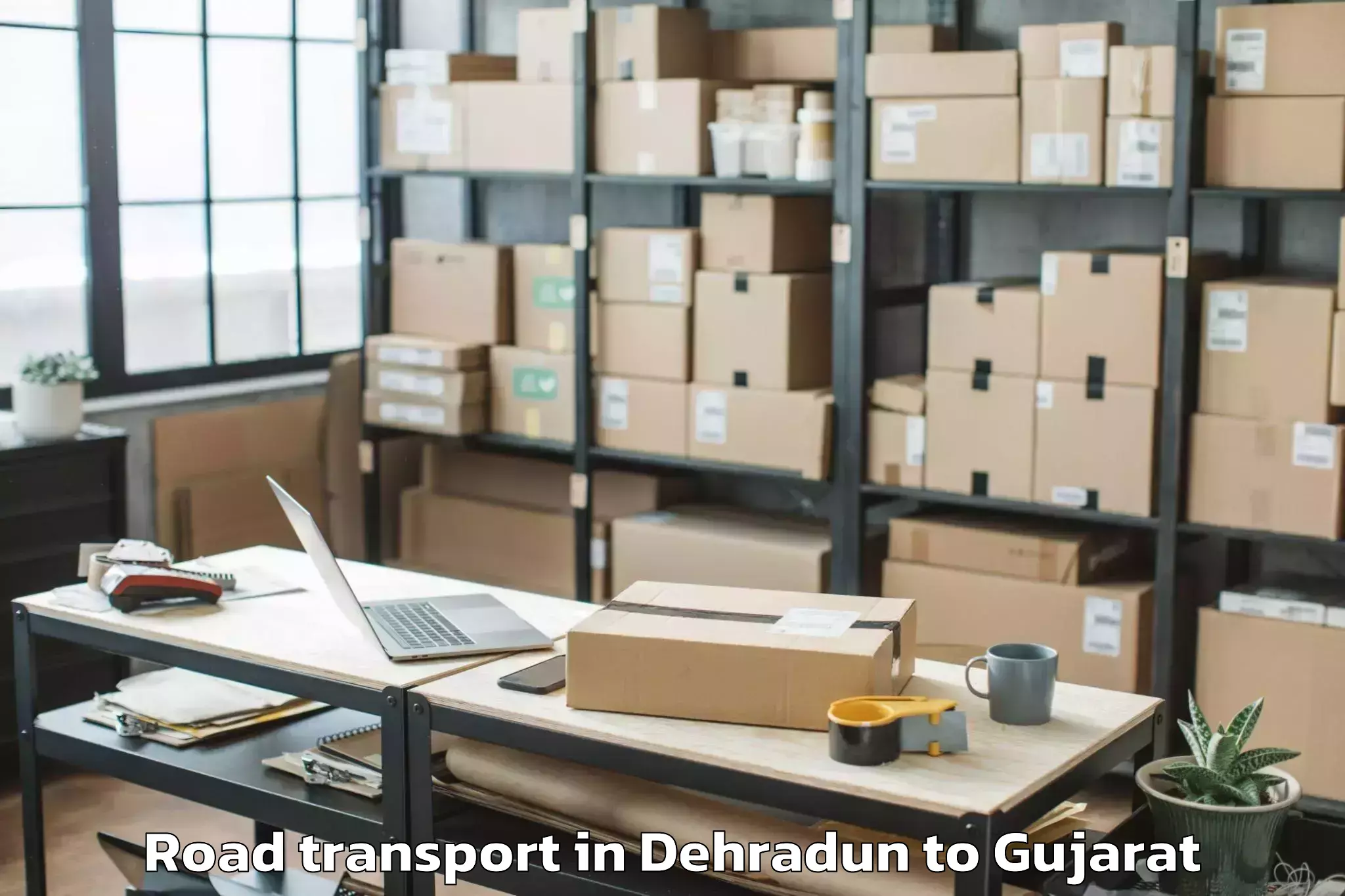 Book Dehradun to Unjha Road Transport